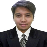 John Alexis Elle wearing a suit and tie